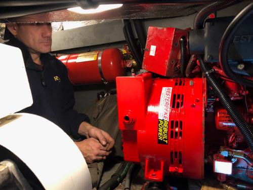 There wasn't a good way to get this generator out for repair, so we did it in situ. It was a tight fit, but we got it done.